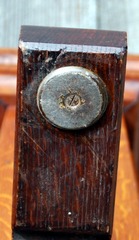  The original bevel to the bottom of the feet is still crisp and the typical large metal casters used by the original L. & J.G. Stickley company remain.